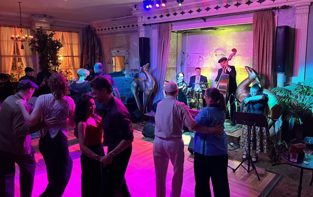 Swing dancing in the Brookdale Ballroom to the Pepper Moons